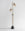 Finish:Antique Brass|||Stone:Black Marble|||Spot Floor Light in antique brass with black marble base