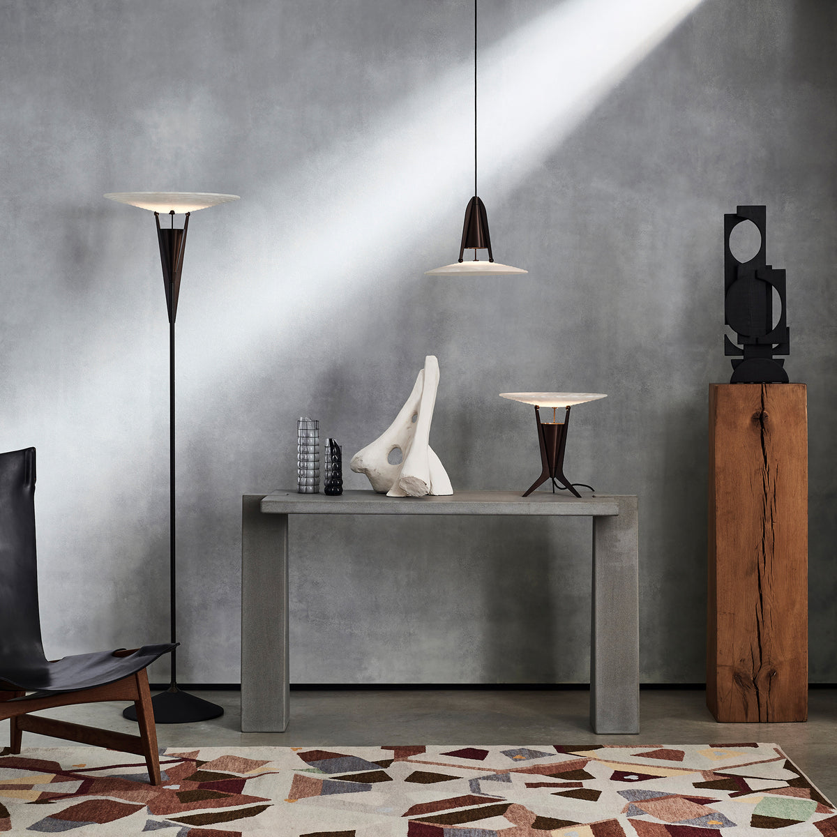 Aragon collection by J Adams &amp; Co. in a grey concrete living room